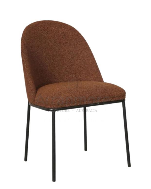 A sleek and modern dining chair upholstered in boucle fabric with a high back for comfort The chair features a powder coated black frame for durability and elegance Available in Terracotta and Oat colors