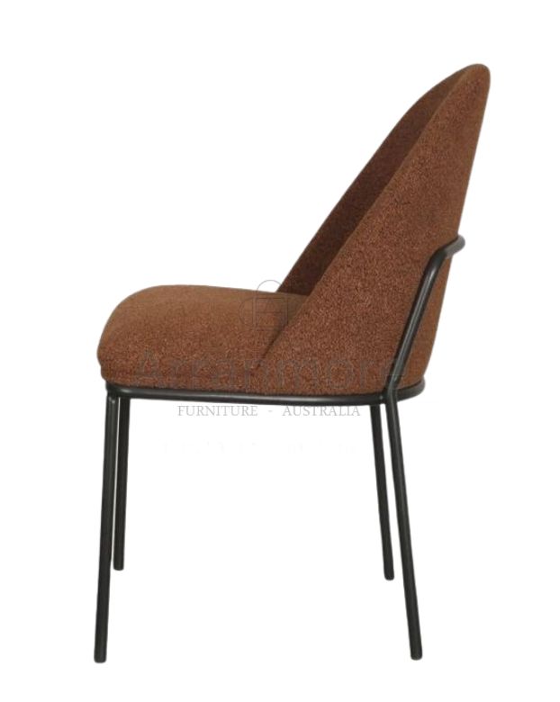 A sleek and modern dining chair upholstered in boucle fabric with a high back for comfort The chair features a powder coated black frame for durability and elegance Available in Terracotta and Oat colors