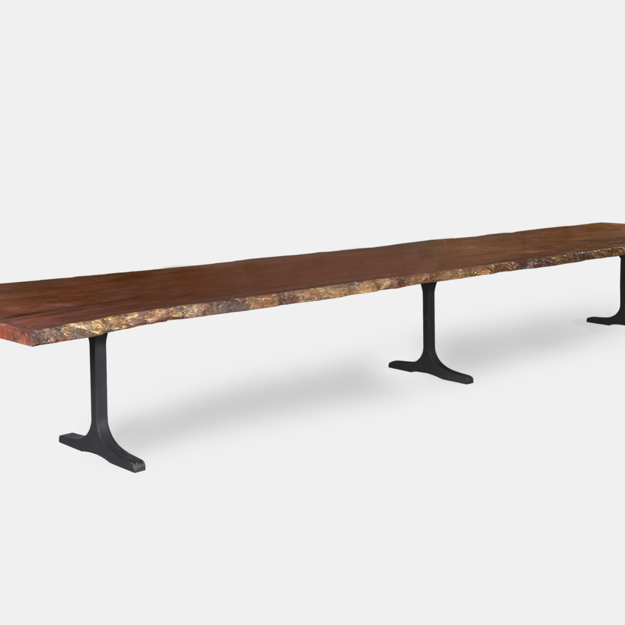 Rouge Dining Table made of Jarrah timber, showcasing its natural beauty and craftsmanship.