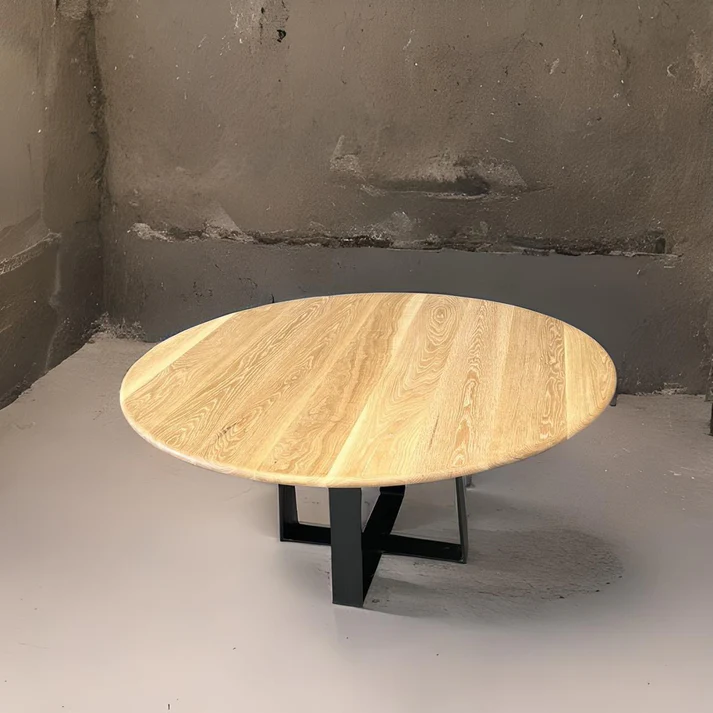 Manly Round Dining Table A stylish centerpiece by Arranmore Furniture featuring a sturdy Nikki Steel Black Textured base Perfect for modern dining spaces seeking industrial sophistication