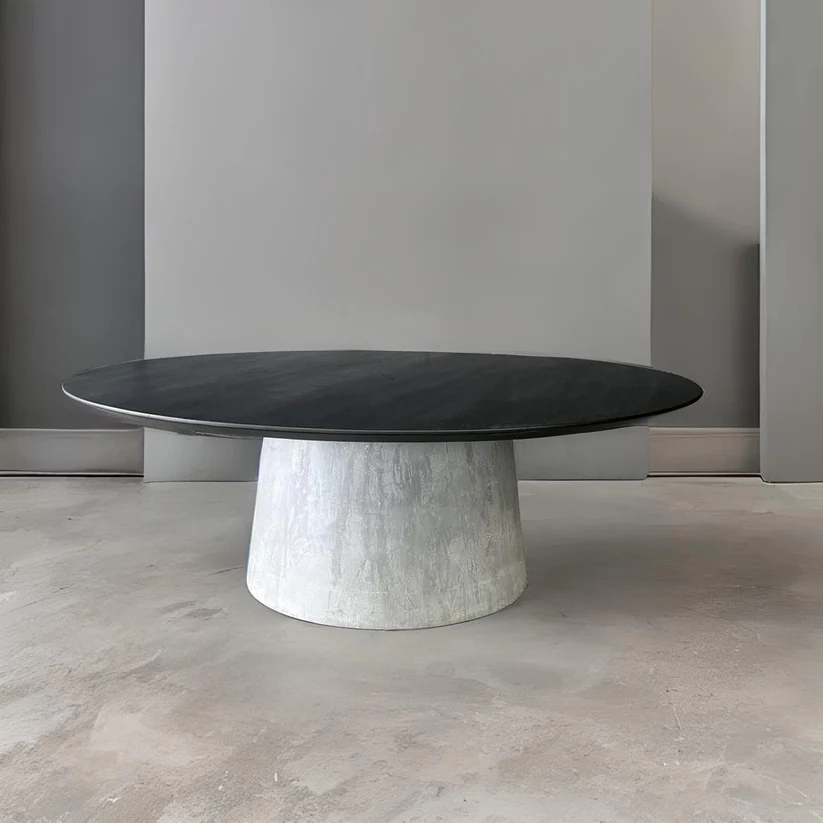 Flinders Round Dining Table A contemporary centerpiece by Arranmore Furniture showcasing a sleek concrete base for an industrial touch Perfect for modern dining spaces seeking both style and durability
