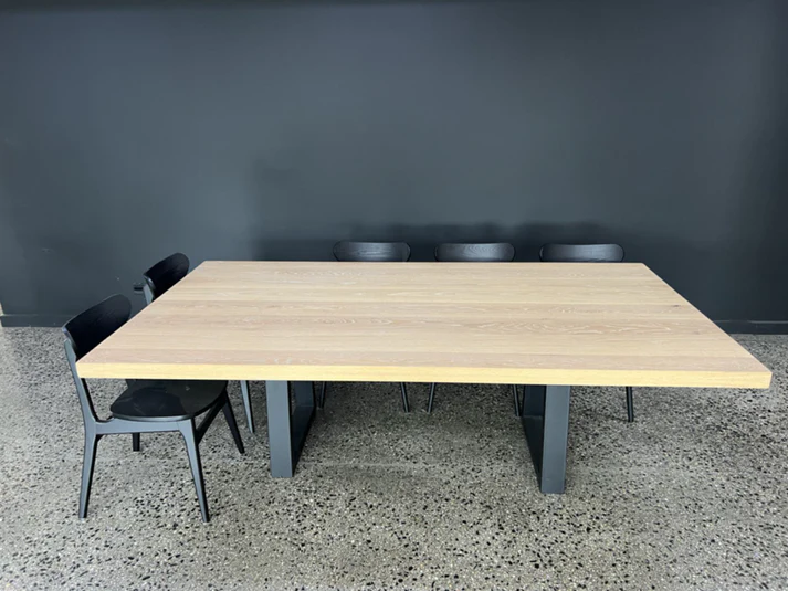 Claremont Dining Table - A versatile centerpiece by Arranmore Furniture, featuring a customizable base in U, Klein, or X Leg design, crafted from timber or steel. Perfect for adding understated elegance to any dining space.