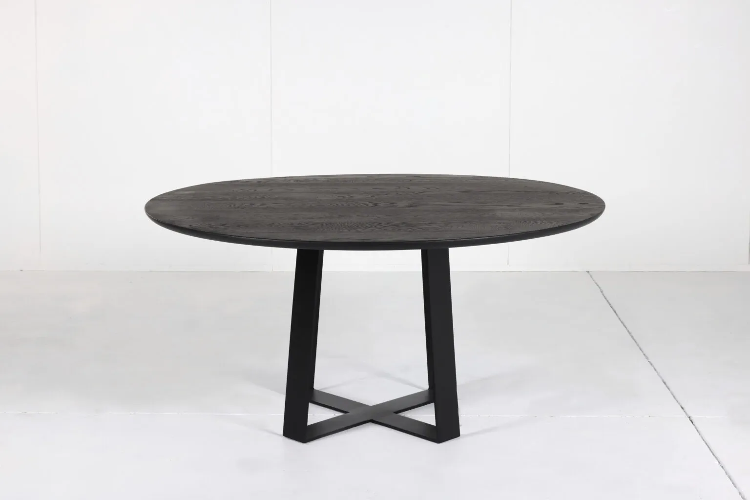 Cottesloe Round Timber Dining Table - A stylish centerpiece by Arranmore Furniture, showcasing an Undercut Convex 25mm edge. Perfect for modern dining spaces seeking contemporary sophistication.