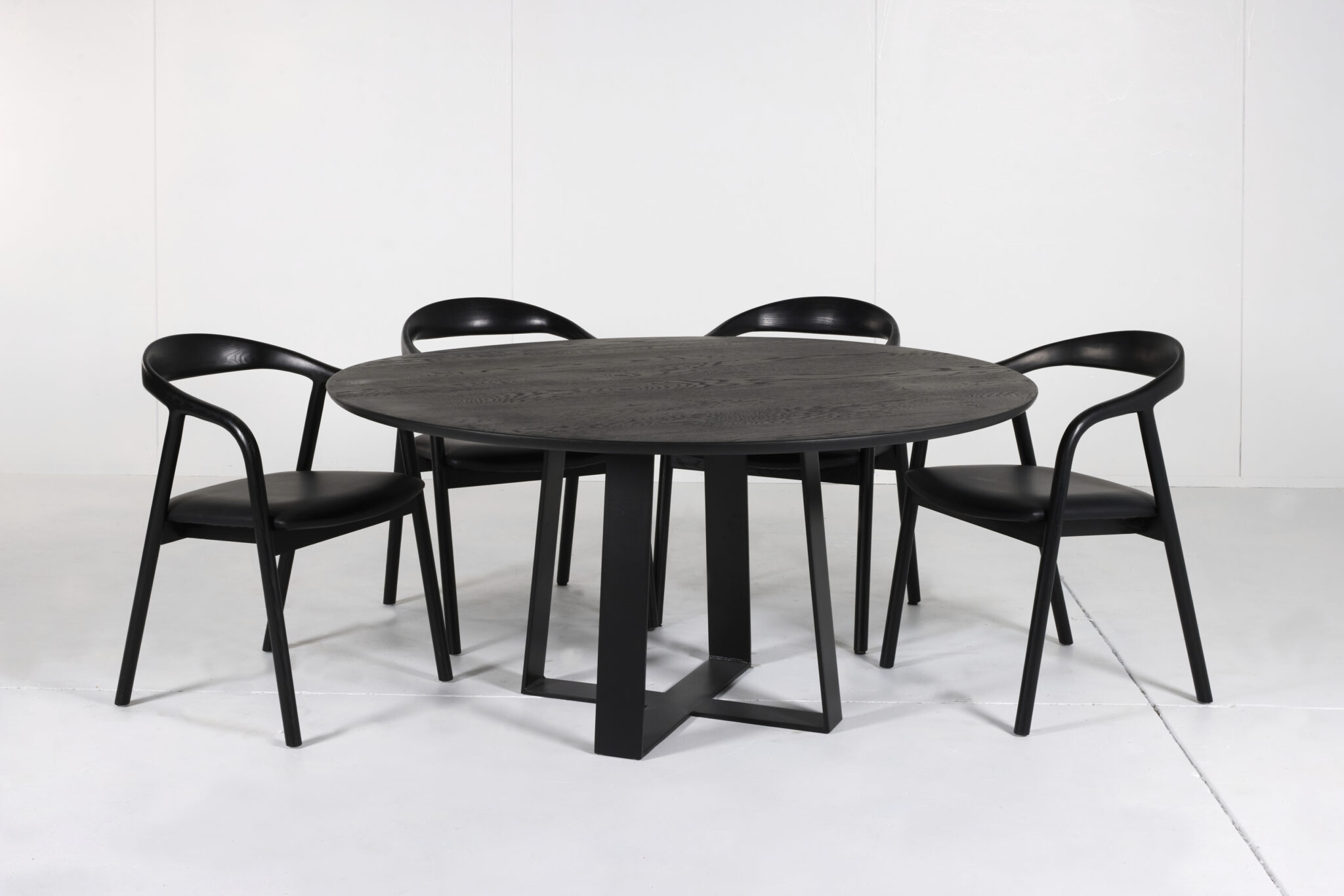 Cottesloe Round Dining Table - A stylish centerpiece by Arranmore Furniture, showcasing an Undercut Convex 25mm edge. Perfect for modern dining spaces seeking contemporary sophistication.