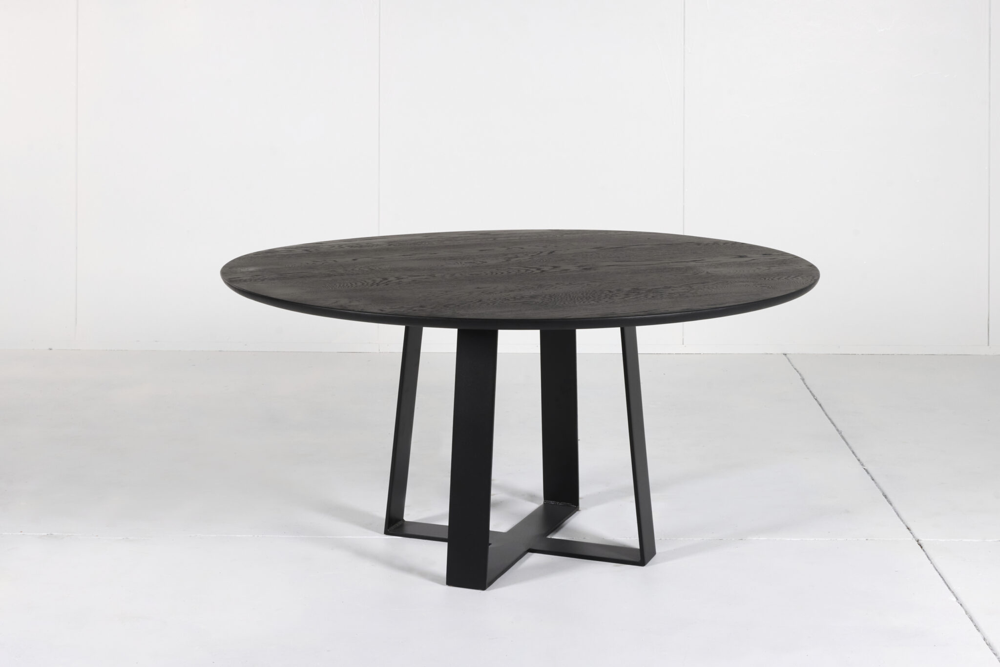 Cottesloe Round Dining Table - A stylish centerpiece by Arranmore Furniture, showcasing an Undercut Convex 25mm edge. Perfect for modern dining spaces seeking contemporary sophistication.