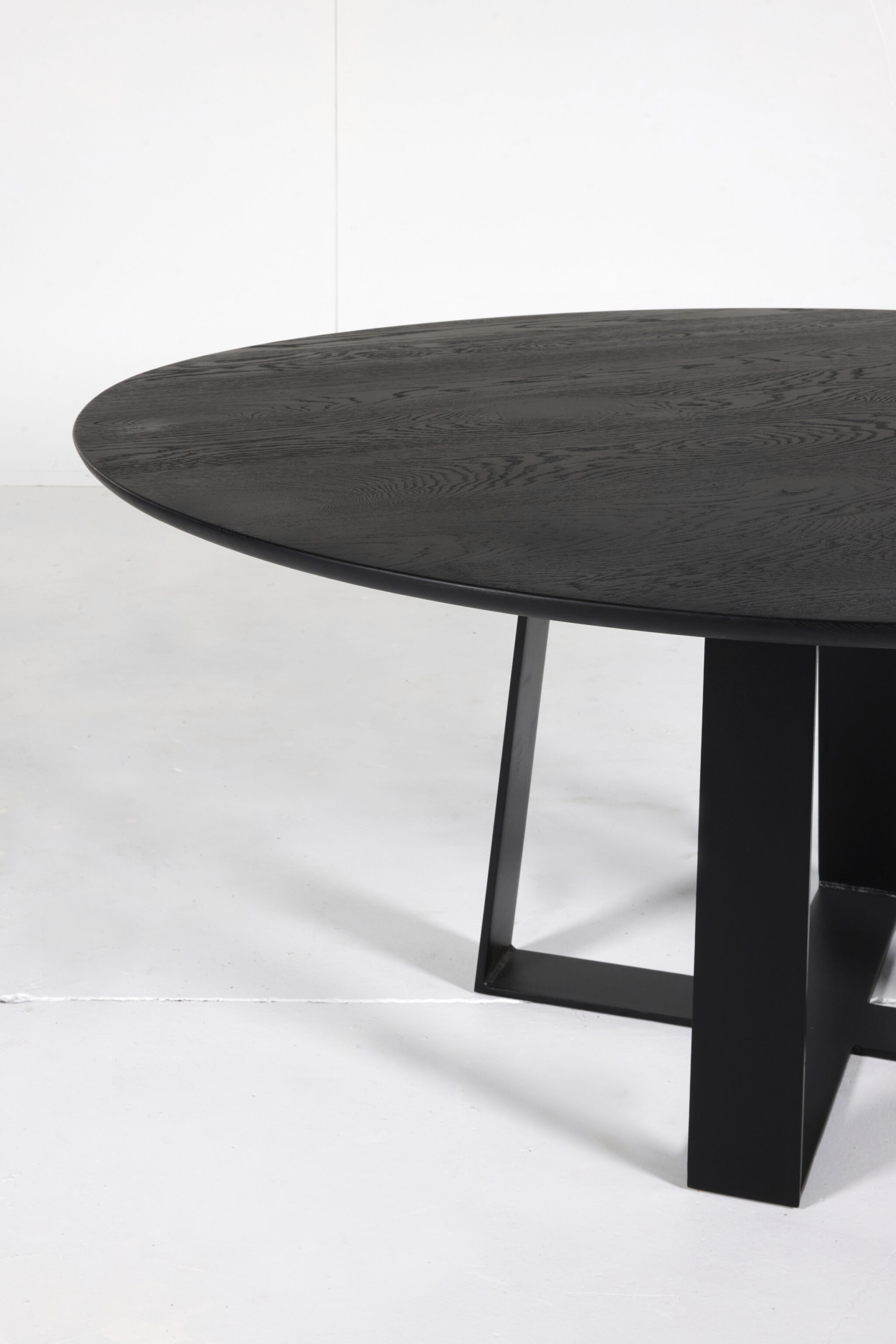 Cottesloe Round Dining Table - A stylish centerpiece by Arranmore Furniture, showcasing an Undercut Convex 25mm edge. Perfect for modern dining spaces seeking contemporary sophistication.