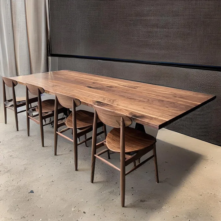 Dolce Dining Table - A stylish centerpiece by Arranmore Furniture, featuring a custom steel base. Perfect for modern dining spaces seeking elegance and personalized design.