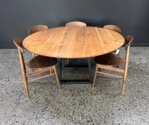 Klein Round Dining Table - A versatile centerpiece by Arranmore Furniture, featuring a customizable base in U or Klein design, crafted from timber or steel. Perfect for adding elegance to any dining space.
