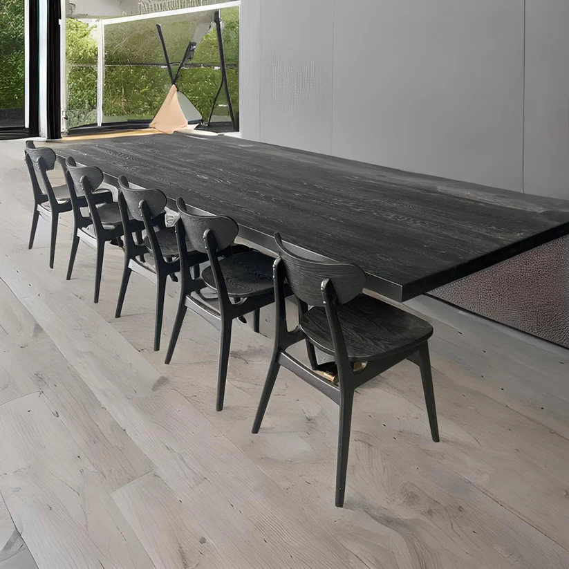 Kingston Dining Table A modern masterpiece by Arranmore Furniture showcasing sleek design and a sturdy Wishbone Steel base Perfect for contemporary dining spaces seeking a touch of industrial chic
