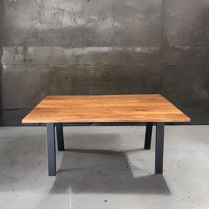 Hamilton Dining Table A stylish centerpiece by Arranmore Furniture featuring a Kooyong Steel base Perfect for modern dining spaces seeking sleek design and industrial charm
