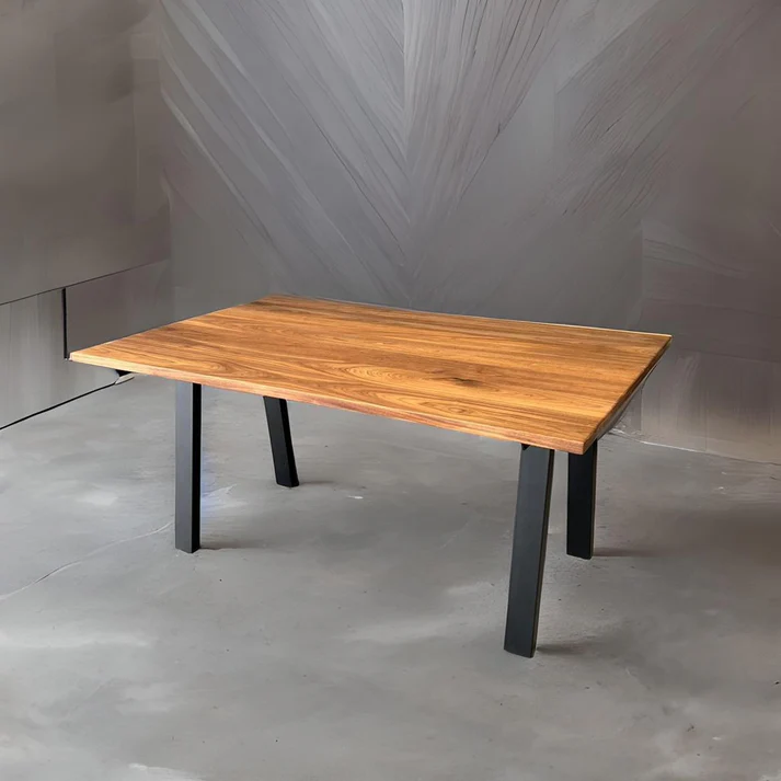 Noix Dining Table - A stylish centerpiece by Arranmore Furniture, featuring a Kooyong Steel base. Perfect for modern dining spaces seeking sleek design and industrial charm.