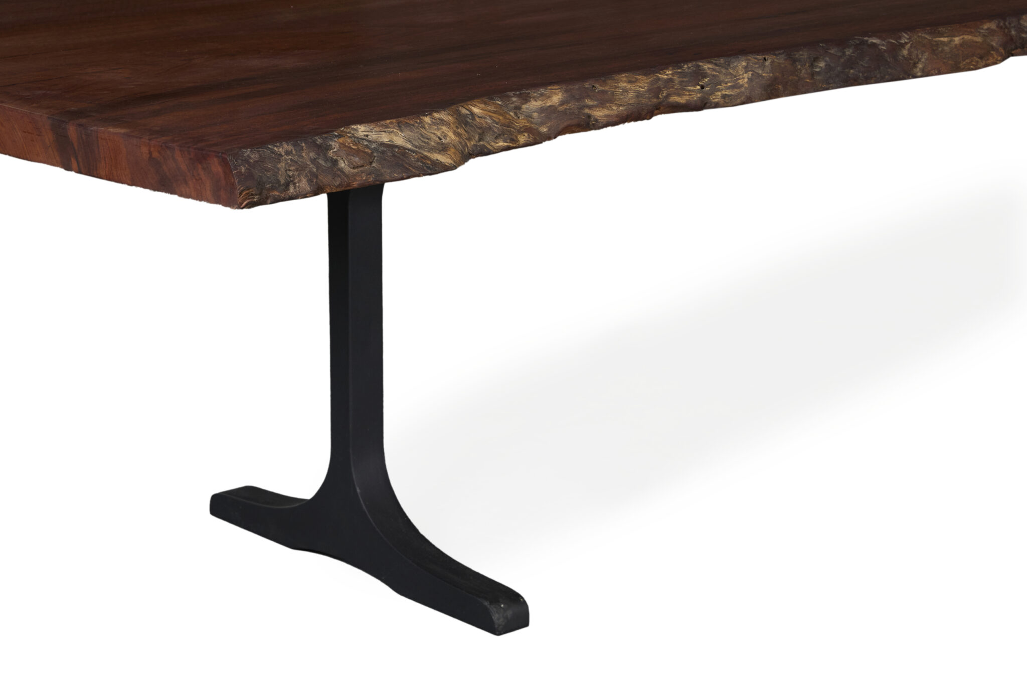 Rouge Dining Table made of Jarrah timber, showcasing its natural beauty and craftsmanship.