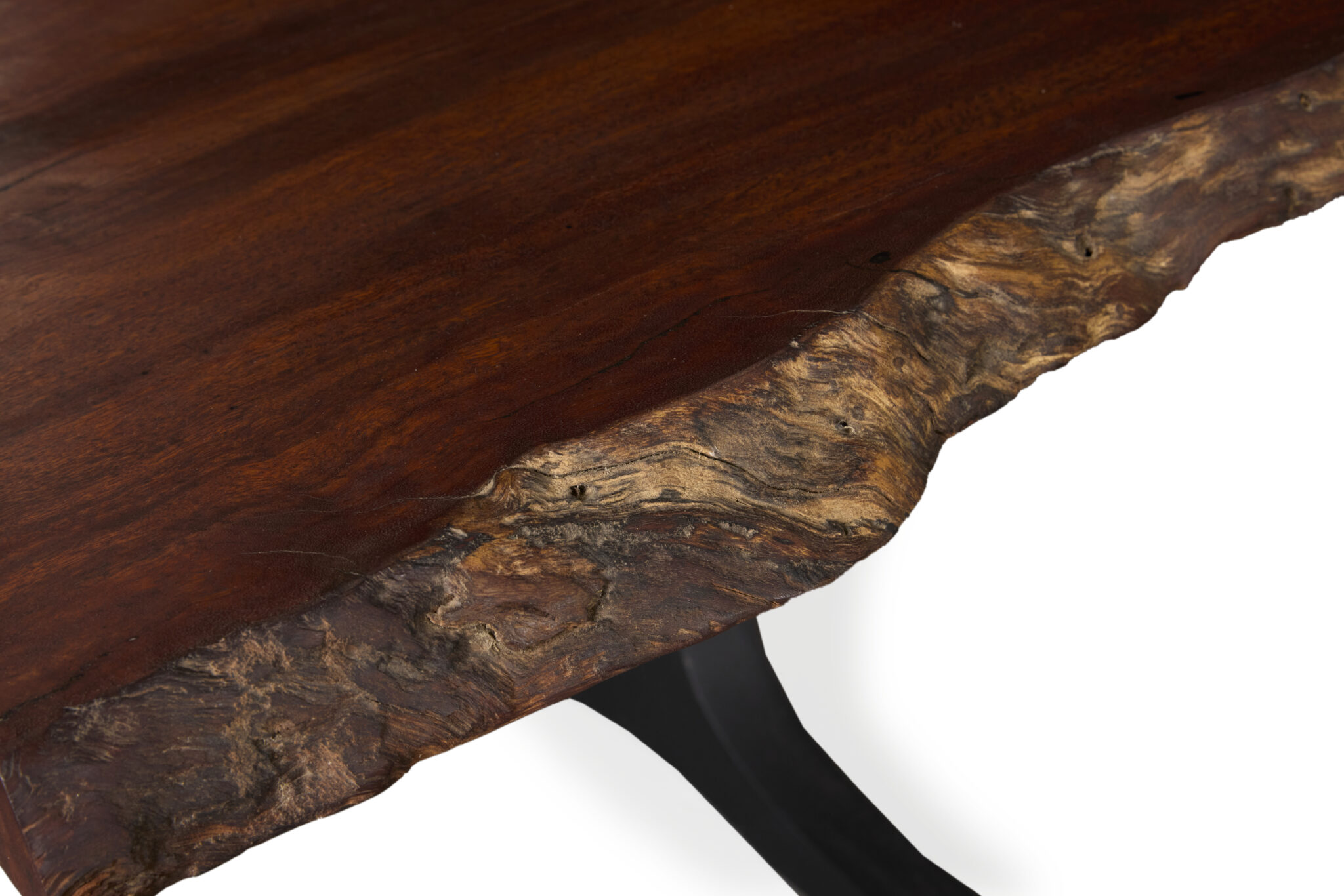 Rouge Dining Table made of Jarrah timber, showcasing its natural beauty and craftsmanship.