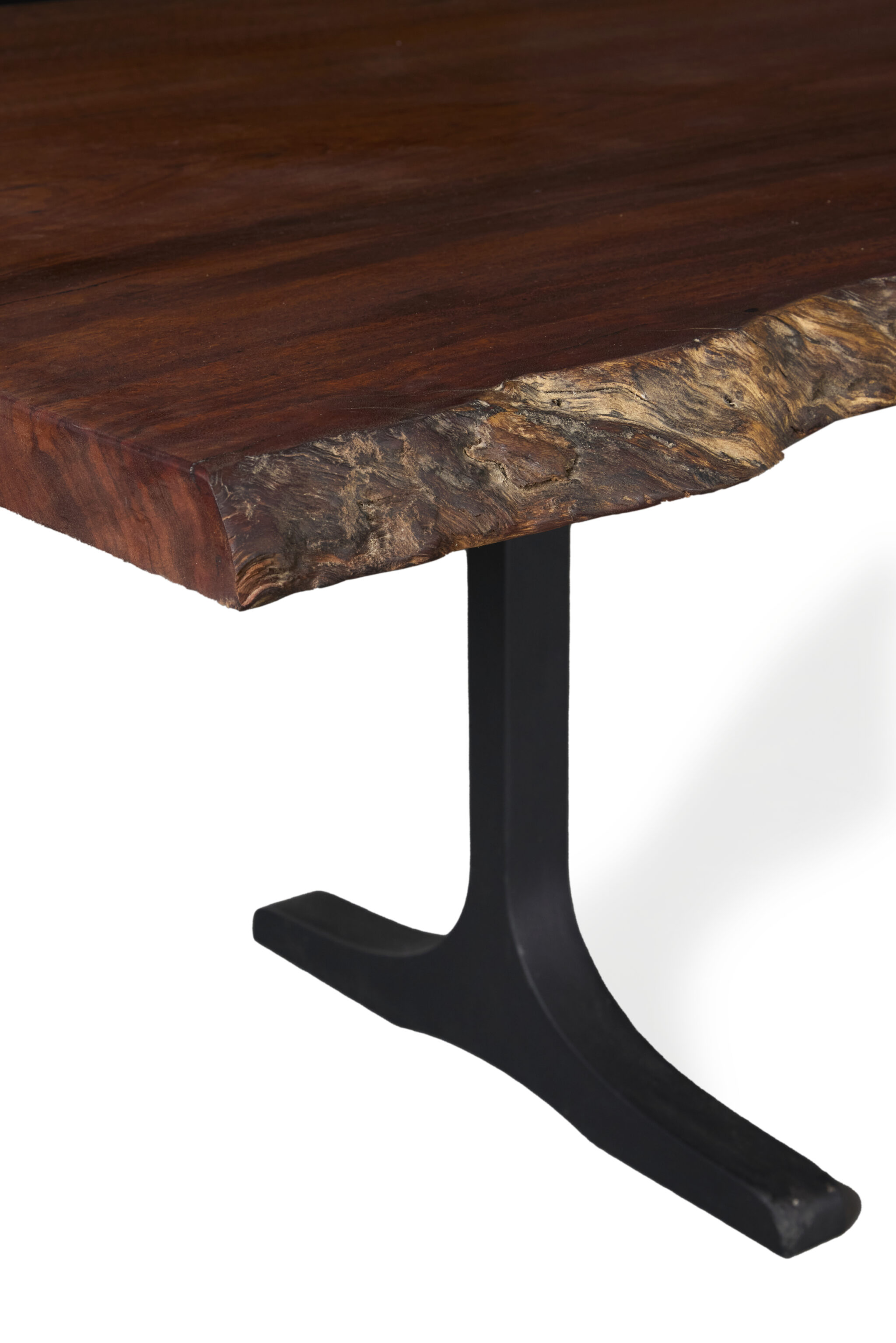 Rouge Dining Table made of Jarrah timber, showcasing its natural beauty and craftsmanship.