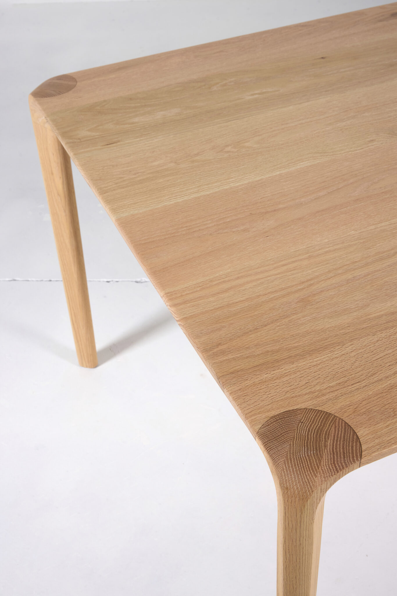 Sara Dining Table - The Sara Leg base not only provides stability but also adds an elegant touch, enhancing the overall aesthetic appeal of the table. Experience sophistication and charm with this beautifully crafted dining table by Arranmore Furniture.