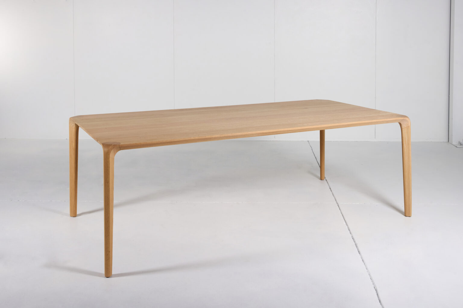 Sara Timber Dining Table - The Sara Leg base not only provides stability but also adds an elegant touch, enhancing the overall aesthetic appeal of the table. Experience sophistication and charm with this beautifully crafted dining table by Arranmore Furniture.