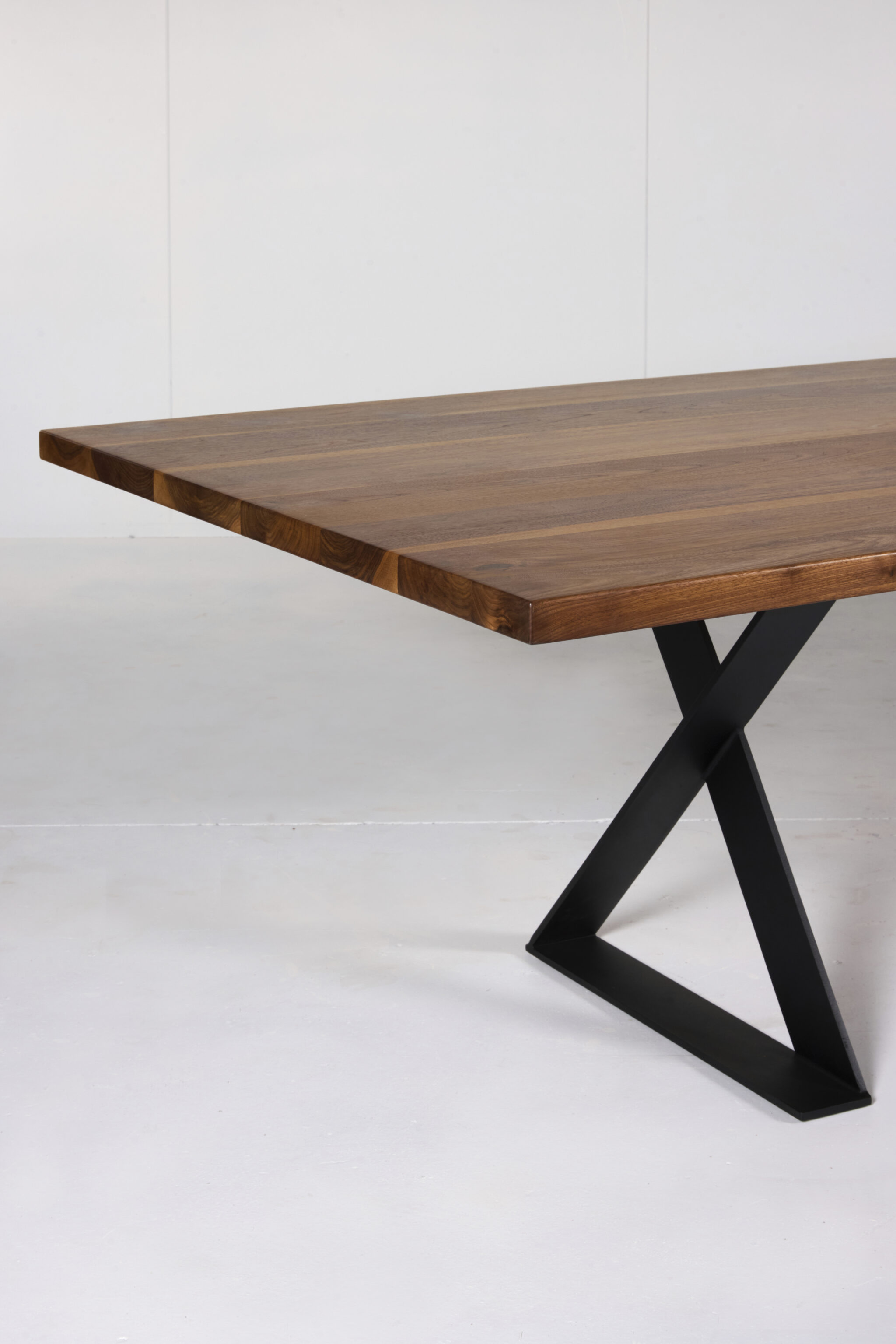 Image of Ballarat Dining Table by Arranmore Furniture, showcasing its sleek X Leg design in a modern dining setting.