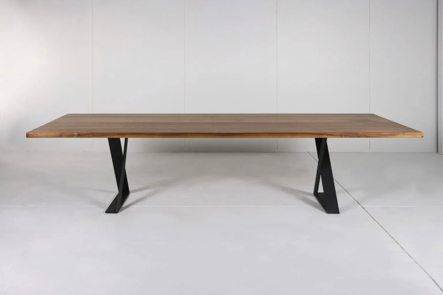 Image of Ballarat Dining Table by Arranmore Furniture, showcasing its sleek X Leg design in a modern dining setting.