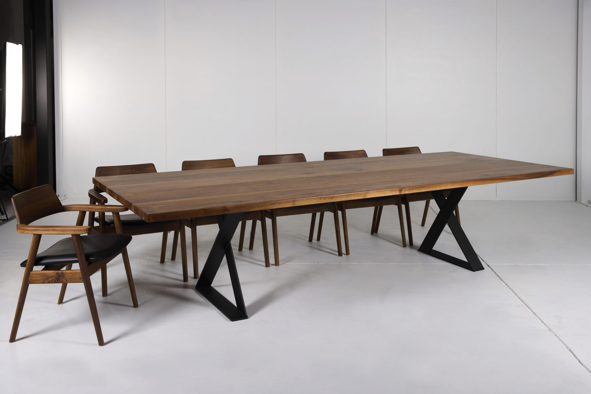 Image of Ballarat Dining Table by Arranmore Furniture, showcasing its sleek X Leg design in a modern dining setting.