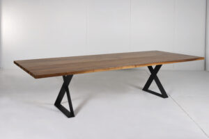 Image of Ballarat Dining Table by Arranmore Furniture, showcasing its sleek X Leg design in a modern dining setting.