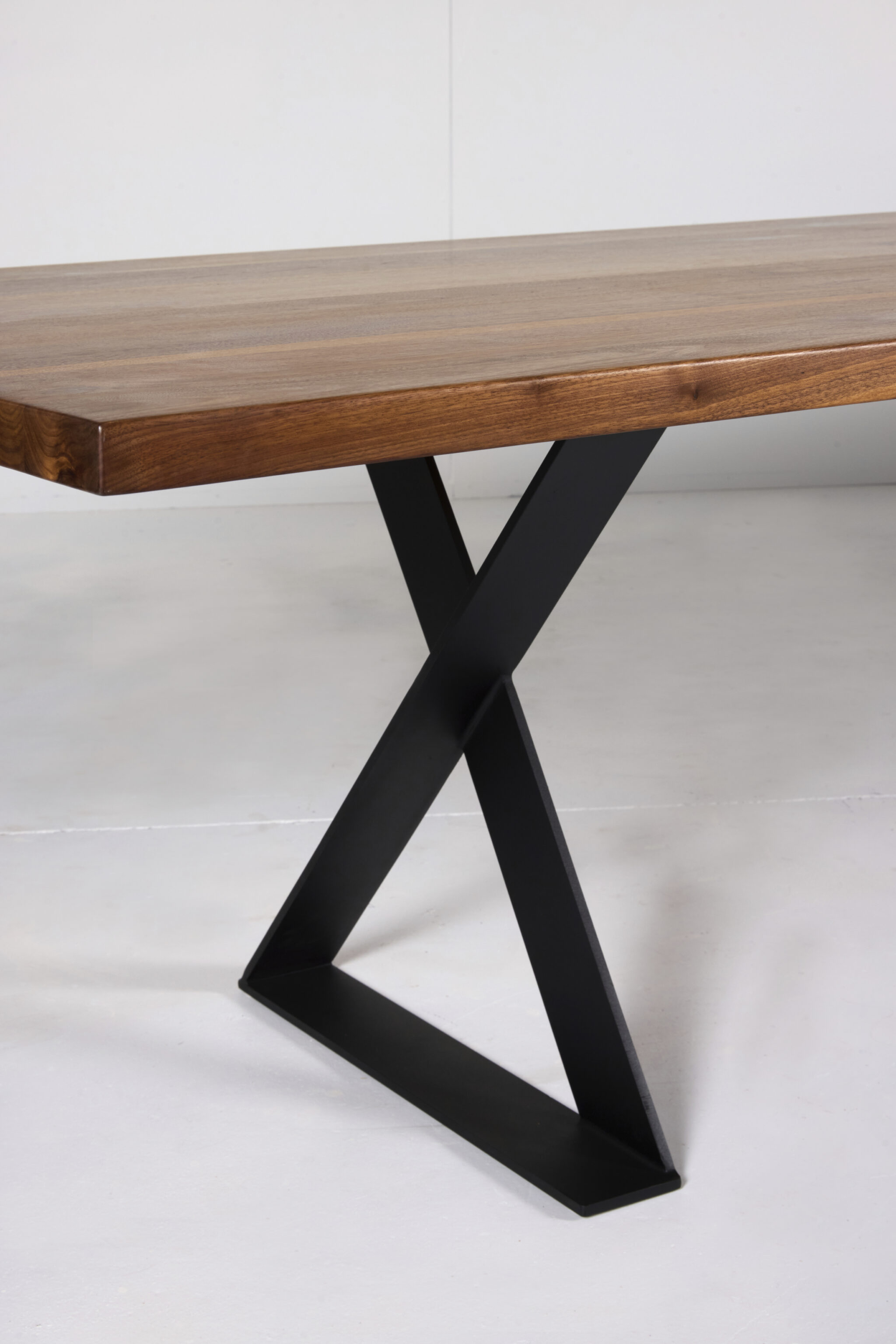 Image of Ballarat Dining Table by Arranmore Furniture, showcasing its sleek X Leg design in a modern dining setting.