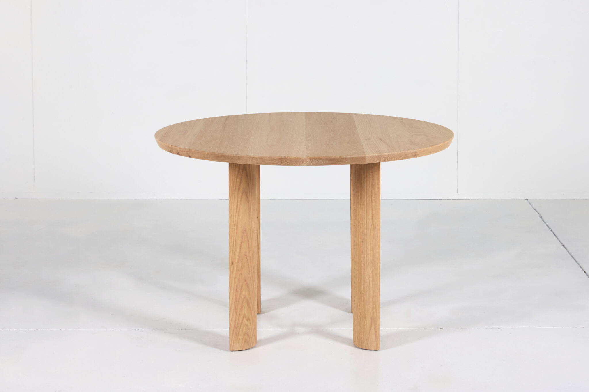 Elsternwick Round Dining Table made from premium timber with a smooth finish, perfect for any dining space.