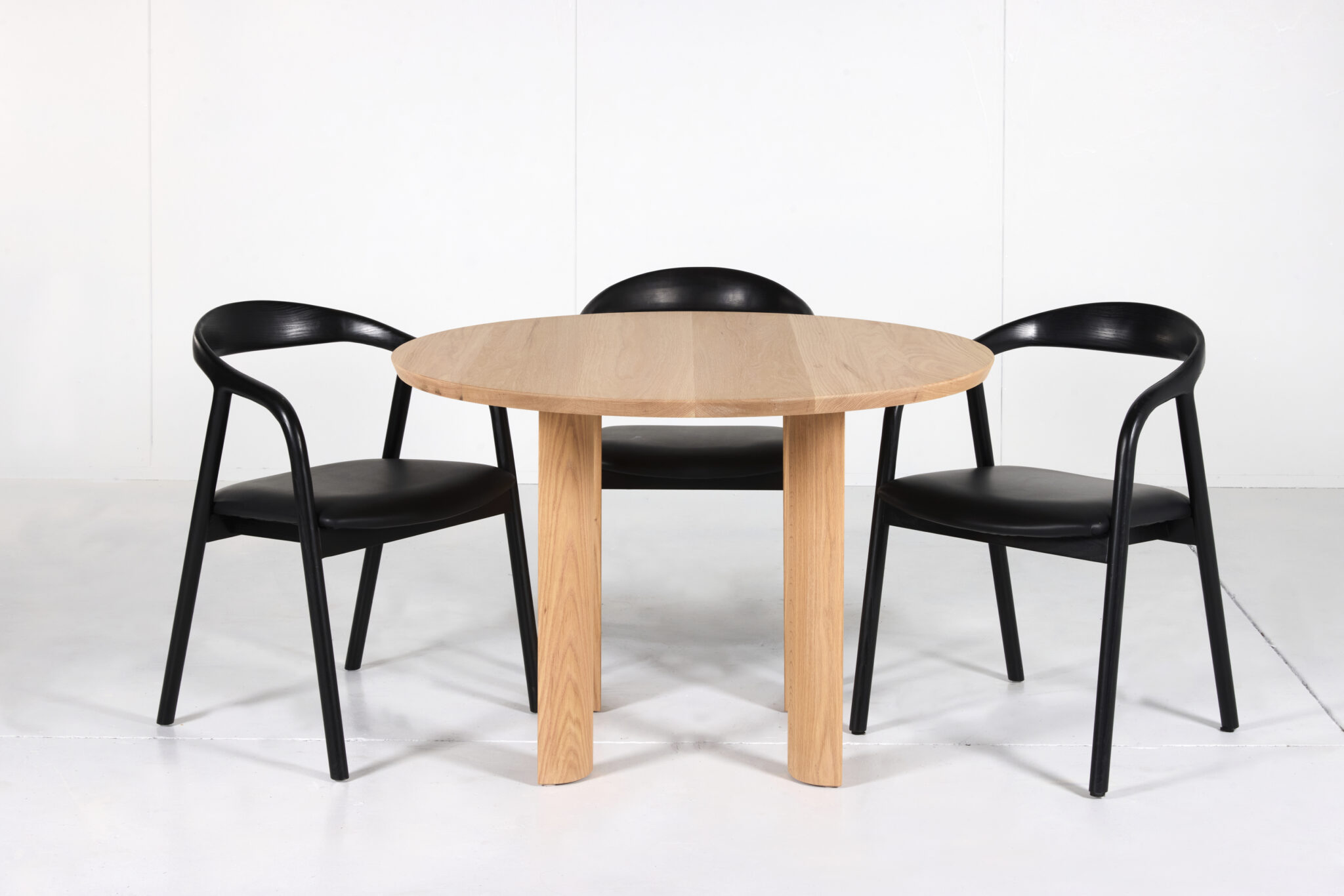 Elsternwick Round Dining Table made from premium timber with a smooth finish, perfect for any dining space.