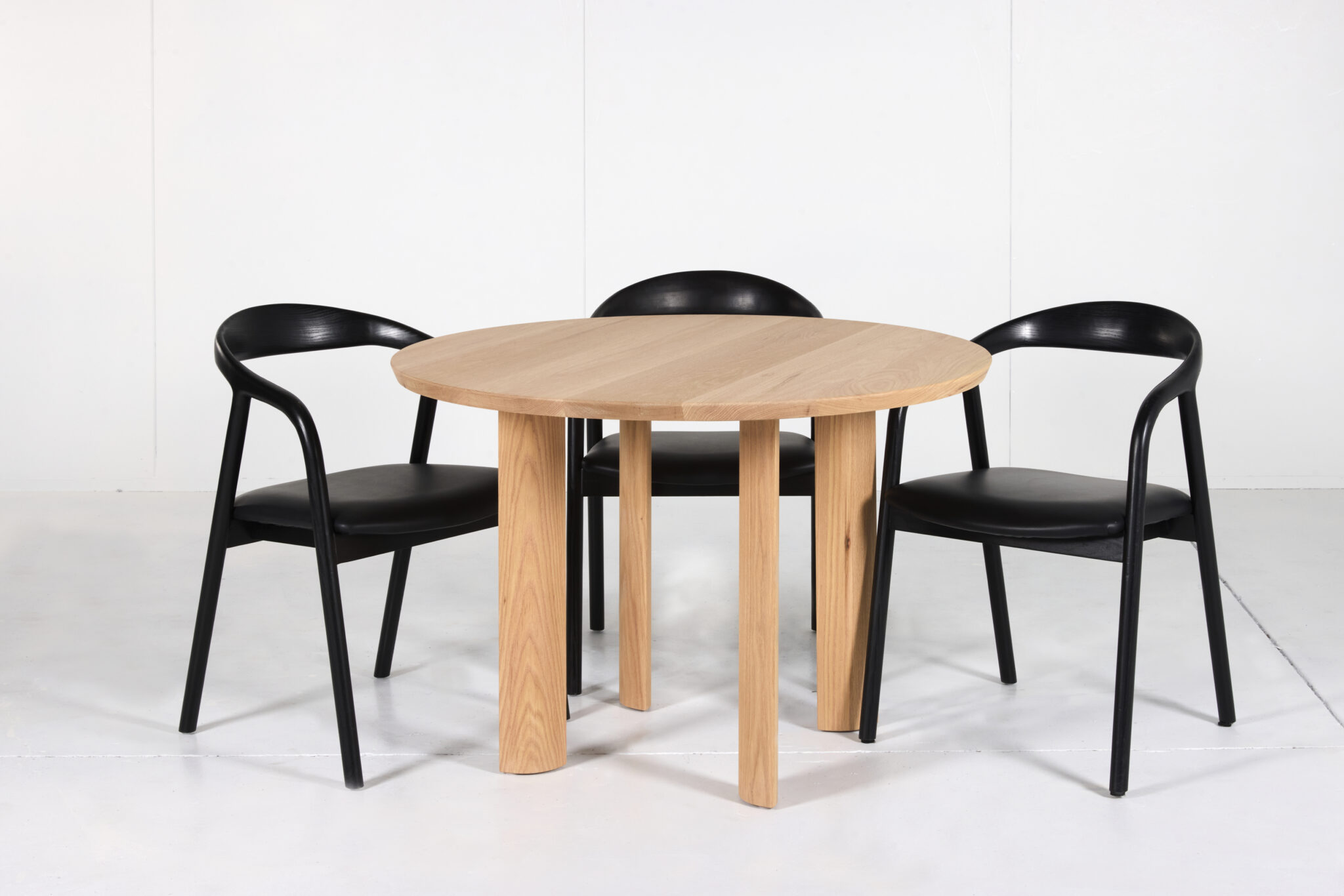 Elsternwick Round Dining Table made from premium timber with a smooth finish, perfect for any dining space.