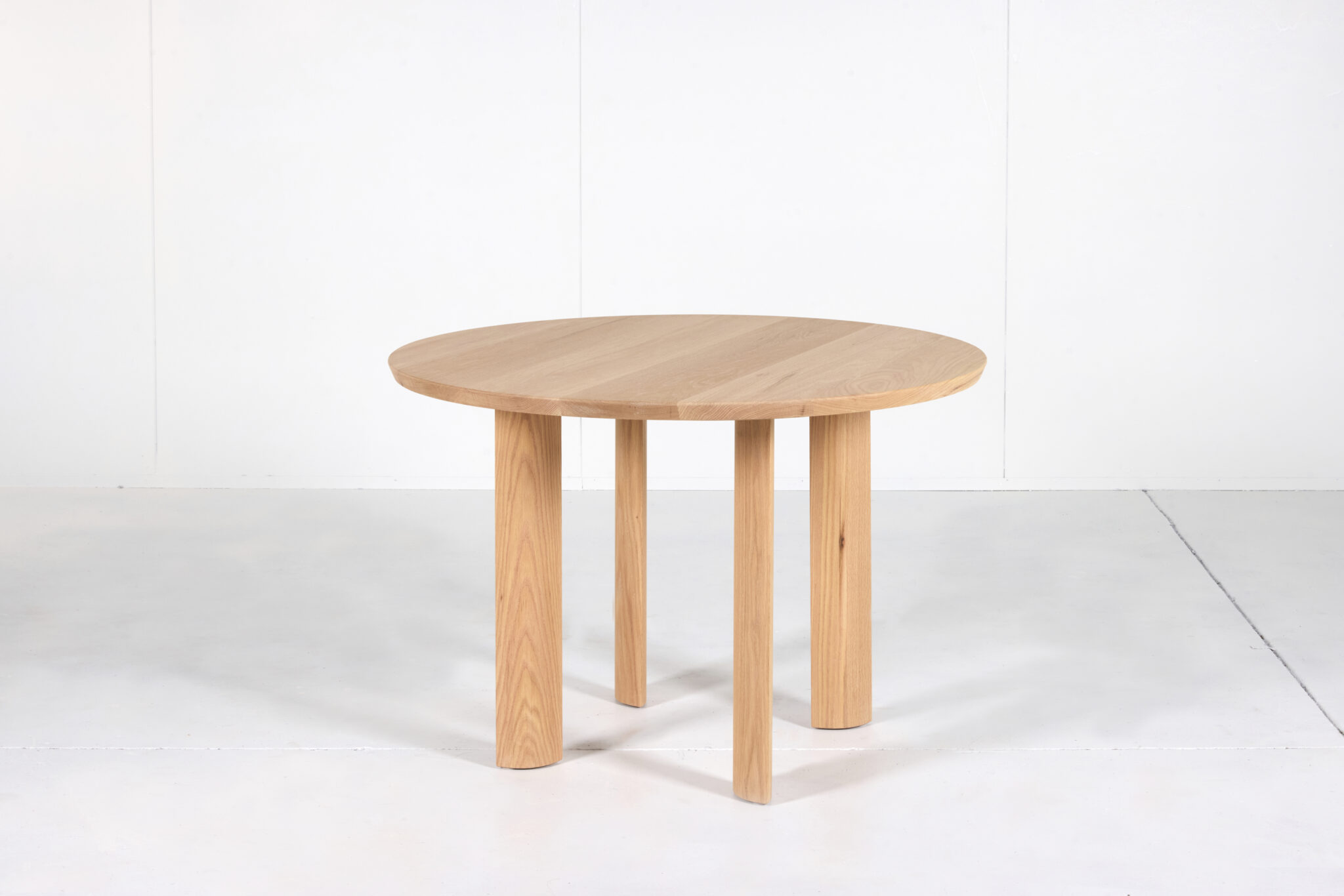 Elsternwick Round Dining Table made from premium timber with a smooth finish perfect for any dining space