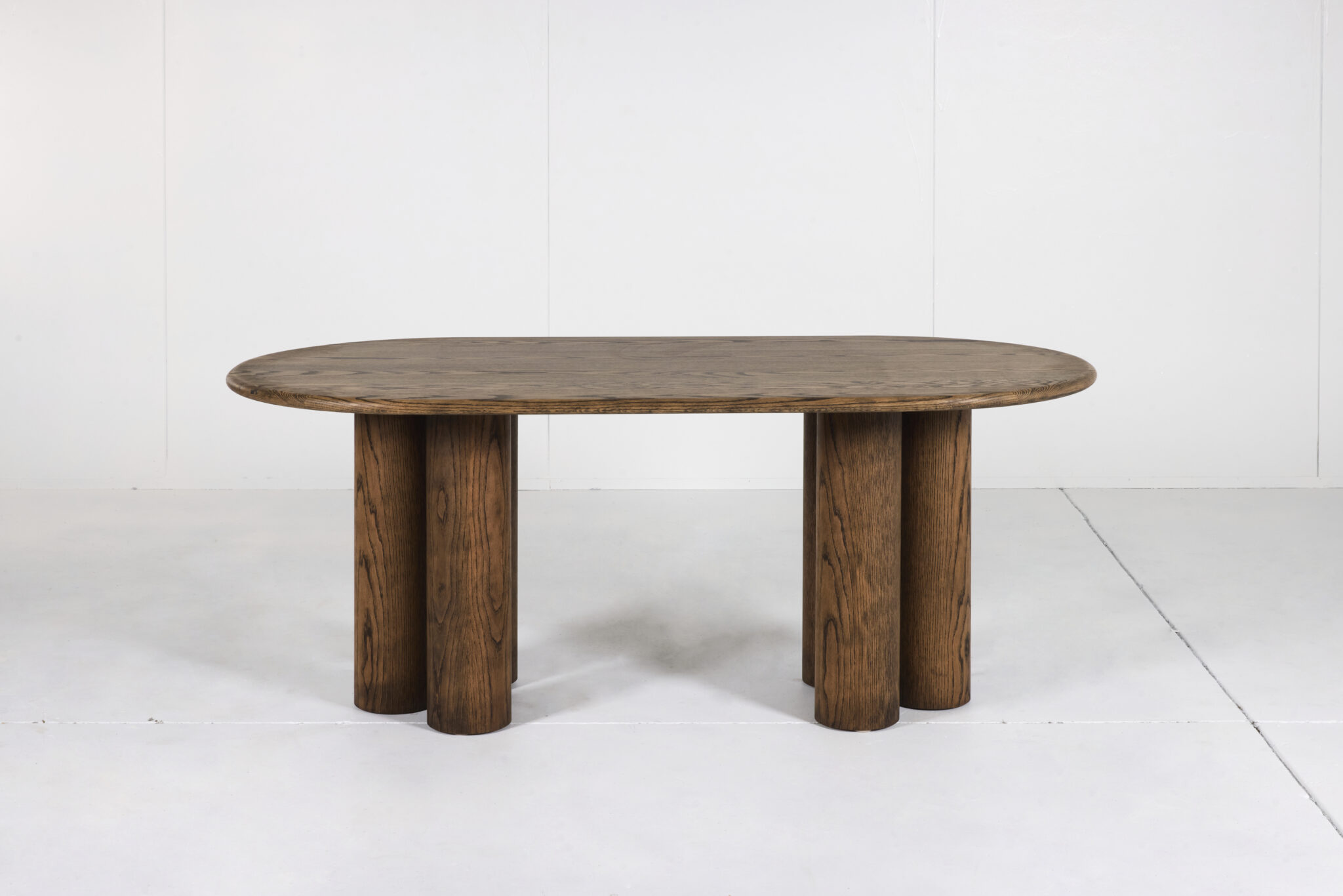 Pillar Dining Table crafted from premium timber with a sleek pencil edge and sturdy pillar base