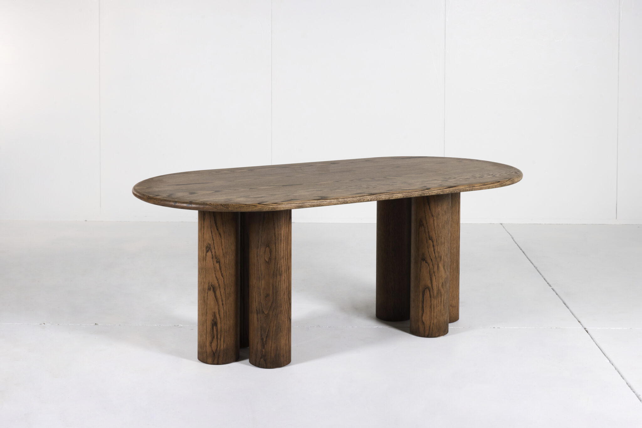 Pillar Dining Table crafted from premium timber with a sleek pencil edge and sturdy pillar base.