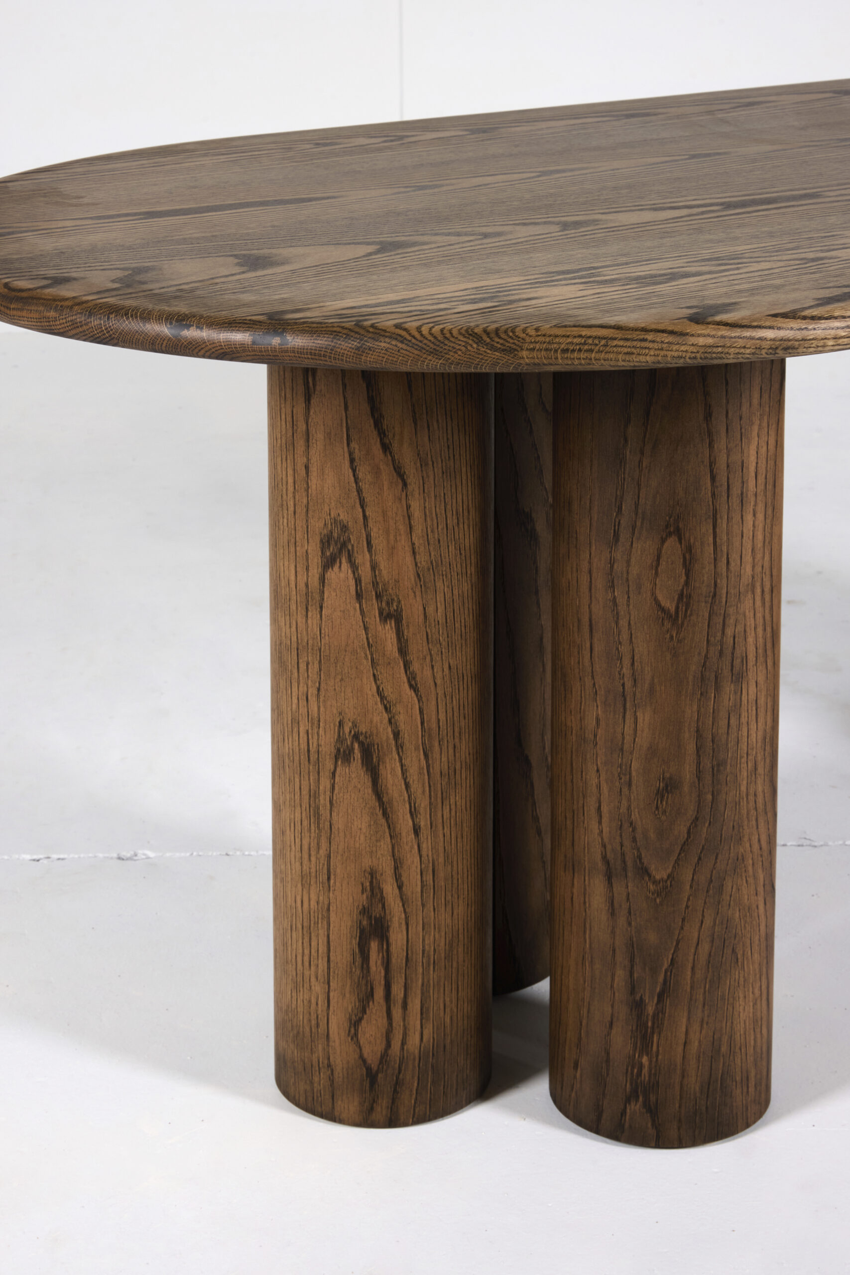 Pillar Dining Table crafted from premium timber with a sleek pencil edge and sturdy pillar base.