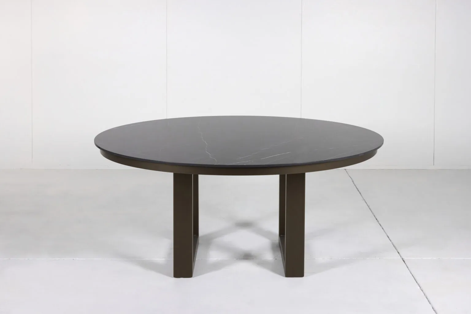 Porcelain Outdoor Round Dining Table with marble top and customizable timber or steel base by Arranmore Furniture.