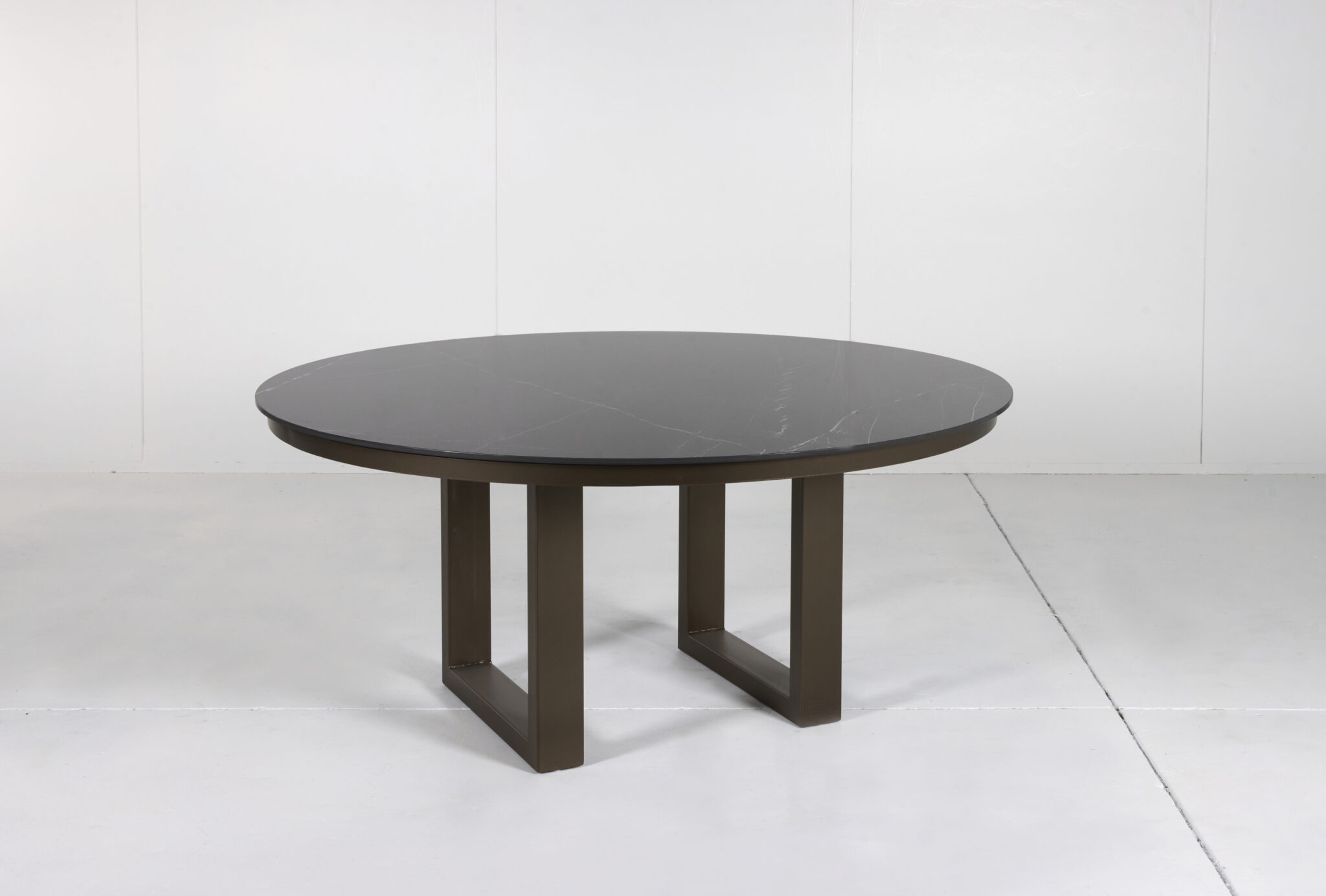 Porcelain Outdoor Round Dining Table with marble top and customizable timber or steel base by Arranmore Furniture.