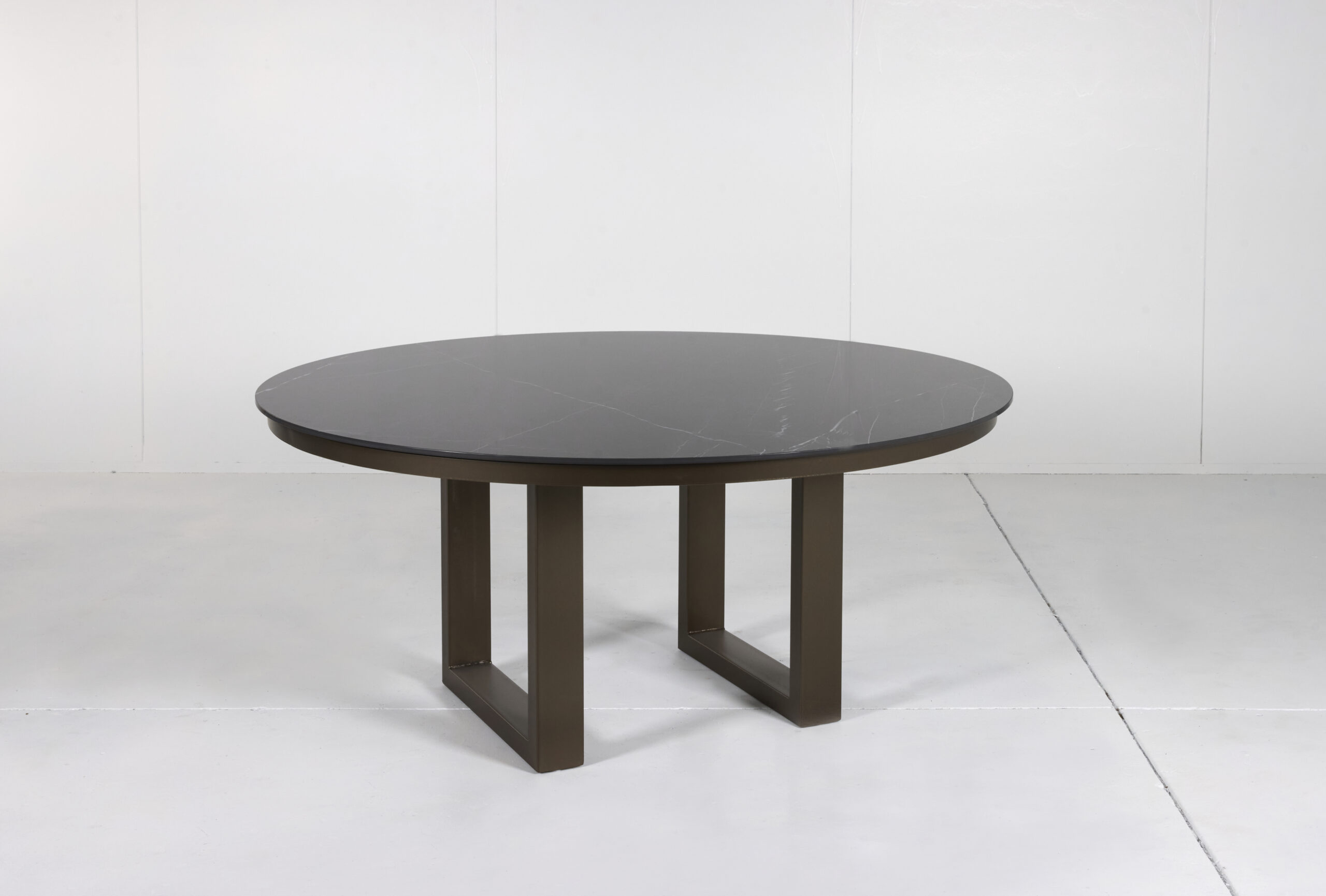 Porcelain Outdoor Round Dining Table with marble top and customizable timber or steel base by Arranmore Furniture.